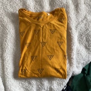Guess tee shirt. Large. Orangish yellow color.